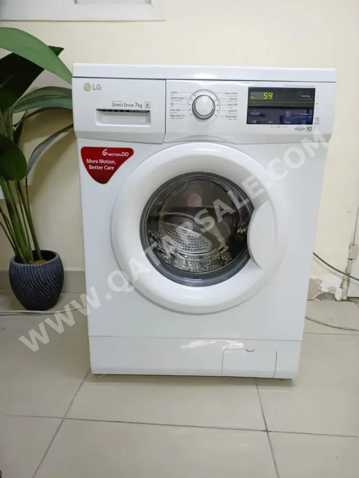 غسالة ملابس & الكل في واحد ال جي \  غسالة تحميل علوي  أبيض