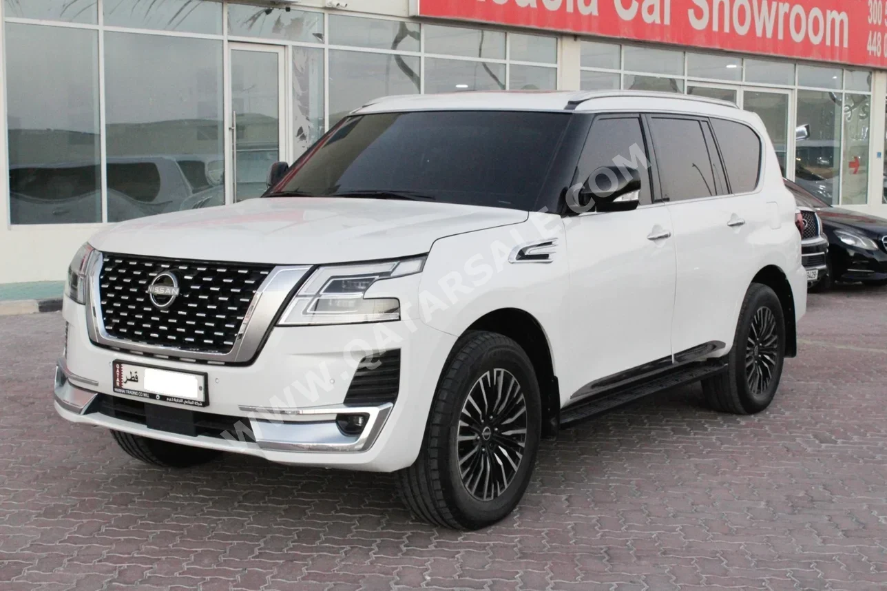 Nissan  Patrol  SE  2014  Automatic  330,000 Km  8 Cylinder  Four Wheel Drive (4WD)  SUV  White