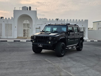 Hummer  H2  2006  Automatic  300,000 Km  8 Cylinder  Four Wheel Drive (4WD)  SUV  Black