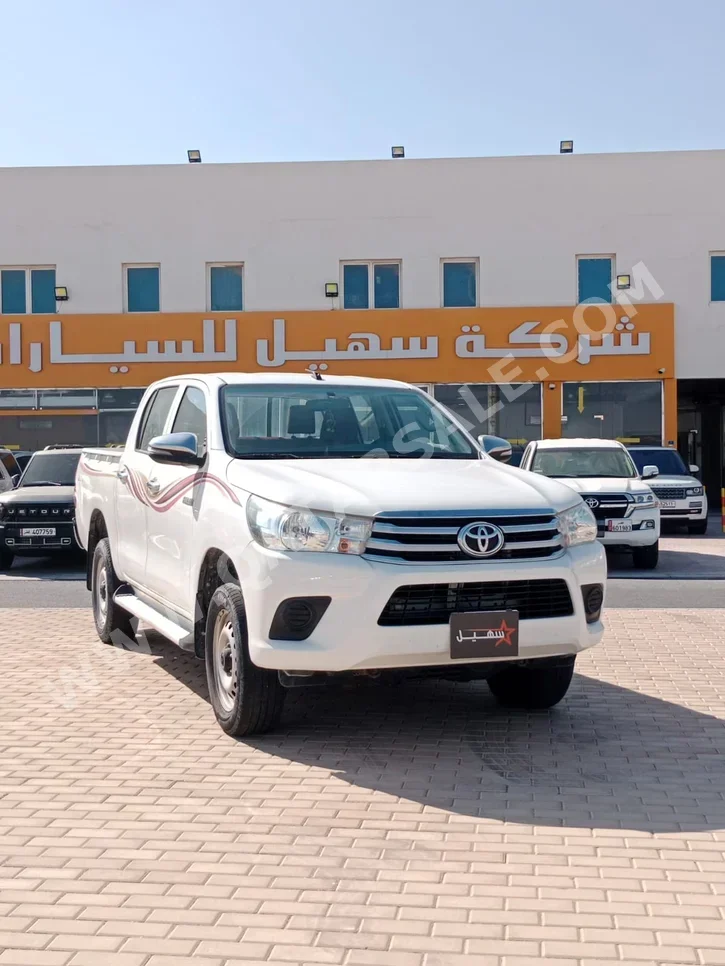 تويوتا هاي لوكس 2021 اوتوماتيك 58,000 كم 4 سلندر دفع رباعي بيكب أبيض