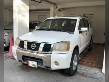 نيسان  أرمادا  اس اي  2006  اوتوماتيك  266,070 كم  8 سلندر  دفع رباعي  اس يو في  أبيض