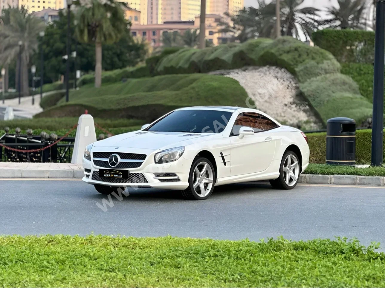 Mercedes-Benz  SL  500 AMG  2013  Automatic  65,000 Km  8 Cylinder  Rear Wheel Drive (RWD)  Convertible  White