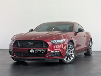 فورد  موستانغ  جي تي  2015  اوتوماتيك  33,877 كم  8 سلندر  دفع خلفي  كوبيه \ سبورت  عنابي