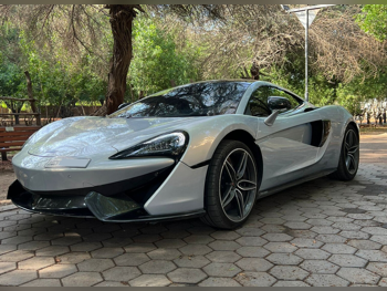 Mclaren  570  GT  2018  Automatic  68,000 Km  8 Cylinder  All Wheel Drive (AWD)  Coupe / Sport  Blue  With Warranty