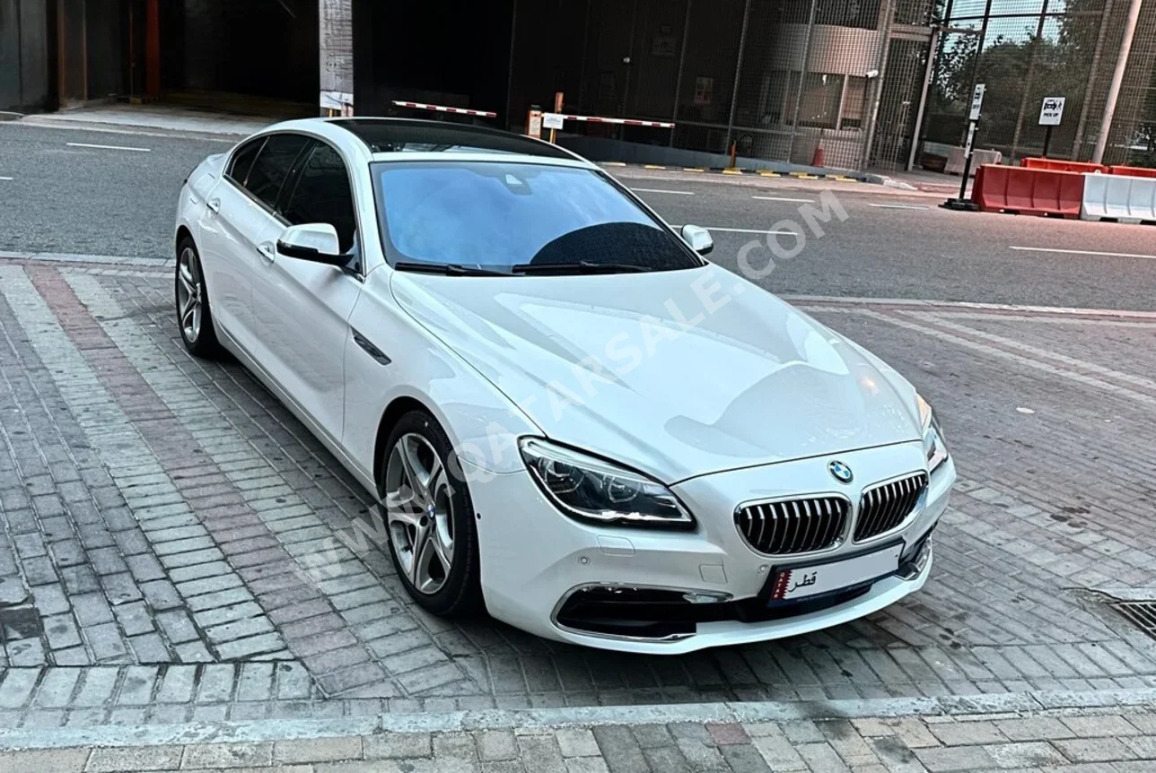 BMW  6-Series  640i Gran Coupe  2016  Automatic  60,786 Km  6 Cylinder  Rear Wheel Drive (RWD)  Sedan  White