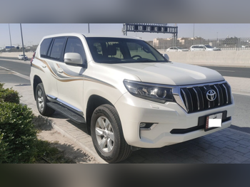 Toyota  Prado  TXL  2018  Automatic  65,000 Km  6 Cylinder  Four Wheel Drive (4WD)  SUV  White