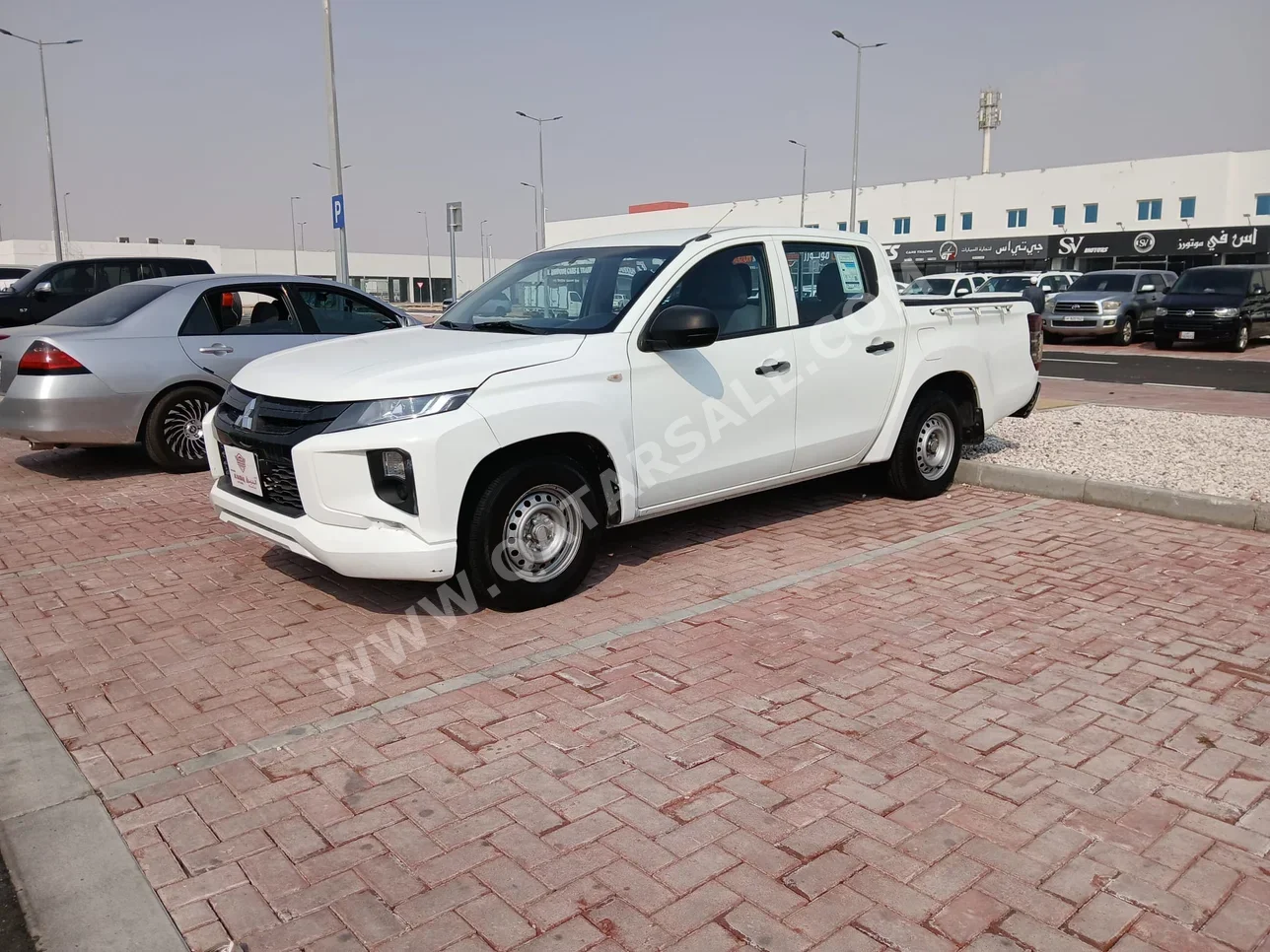 Mitsubishi  L 200  2020  Manual  150,000 Km  4 Cylinder  Rear Wheel Drive (RWD)  Pick Up  White