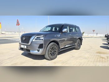 Nissan  Patrol  Platinum  2023  Automatic  99,000 Km  6 Cylinder  Four Wheel Drive (4WD)  SUV  Gray  With Warranty