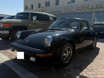 بورش  911  تارجا 4  1975  عادي  14,000 كم  6 سلندر  دفع خلفي  كلاسك  أسود