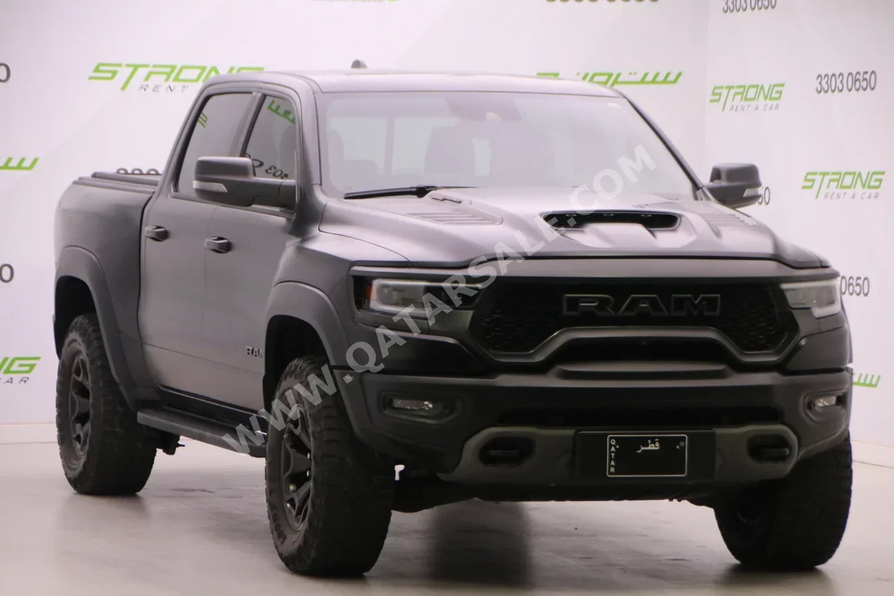دودج  رام  تي أر إكس  2023  اوتوماتيك  31,000 كم  8 سلندر  دفع رباعي  بيكب  أسود  تحت الضمان
