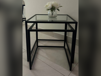 الطاولات والخزائن الجانبية منضدة القهوة  - هوم سينتر  - زجاج  - أسود
