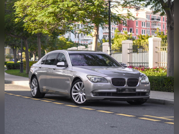 BMW  7-Series  740 iL  2013  Automatic  111,000 Km  6 Cylinder  All Wheel Drive (AWD)  Sedan  Gold