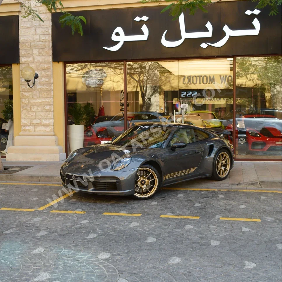 بورش  911  توربو  2022  اوتوماتيك  43,900 كم  6 سلندر  دفع خلفي  كوبيه \ سبورت  رمادي
