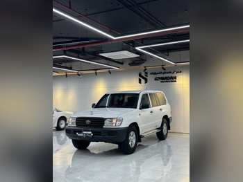 Toyota  Land Cruiser  G  2004  Manual  398,000 Km  6 Cylinder  Four Wheel Drive (4WD)  SUV  White