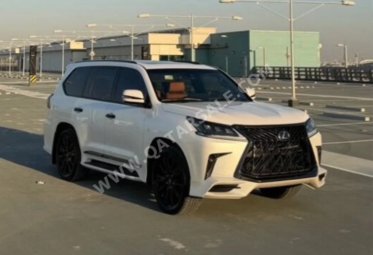 لكزس ال اكس 570 اس بلاك ايديشن 2020 اوتوماتيك 110,000 كم 8 سلندر دفع رباعي اس يو في أبيض لؤلؤي