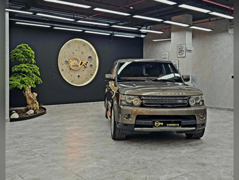 Land Rover  Range Rover  Sport  2012  Automatic  125,000 Km  8 Cylinder  Four Wheel Drive (4WD)  SUV  Brown