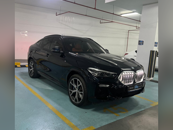 بي ام دبليو  الفئة - اكس  اكس 6  40i ام  2021  اوتوماتيك  76,000 كم  6 سلندر  دفع رباعي  اس يو في  أزرق غامق  تحت الضمان