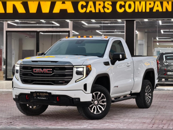 جي ام سي  سييرا  اي تي 4  2023  اوتوماتيك  36,000 كم  8 سلندر  دفع رباعي  بيكب  أبيض  تحت الضمان