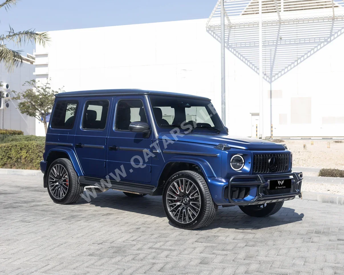 مرسيدس - بنز  جي - كلاس  63 اي ام جي  2025  اوتوماتيك  2,000 كم  8 سلندر  دفع رباعي  اس يو في  ازرق  تحت الضمان