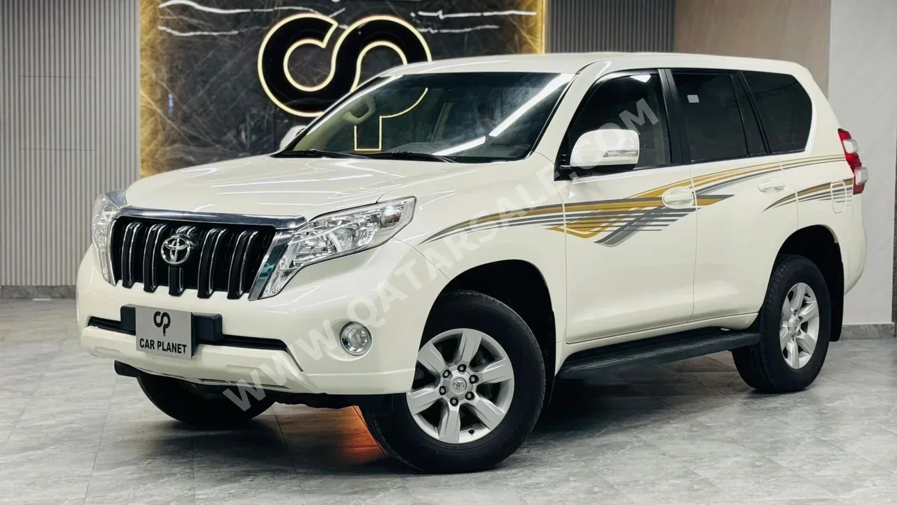 تويوتا  برادو  تي اكس ال  2016  اوتوماتيك  150,000 كم  4 سلندر  دفع رباعي  اس يو في  أبيض