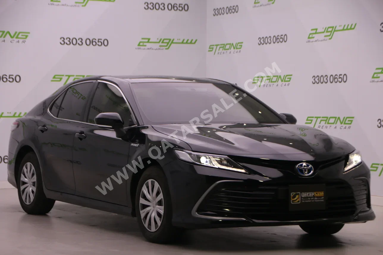 تويوتا  كامري  هايبرد  2024  اوتوماتيك  4,000 كم  4 سلندر  سحب امامي  سيدان  أسود  تحت الضمان