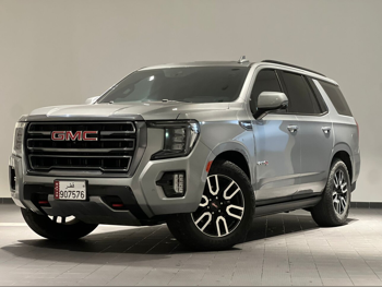 جي ام سي  يوكون  اي تي 4  2023  اوتوماتيك  50,000 كم  8 سلندر  دفع رباعي  اس يو في  رمادي  تحت الضمان