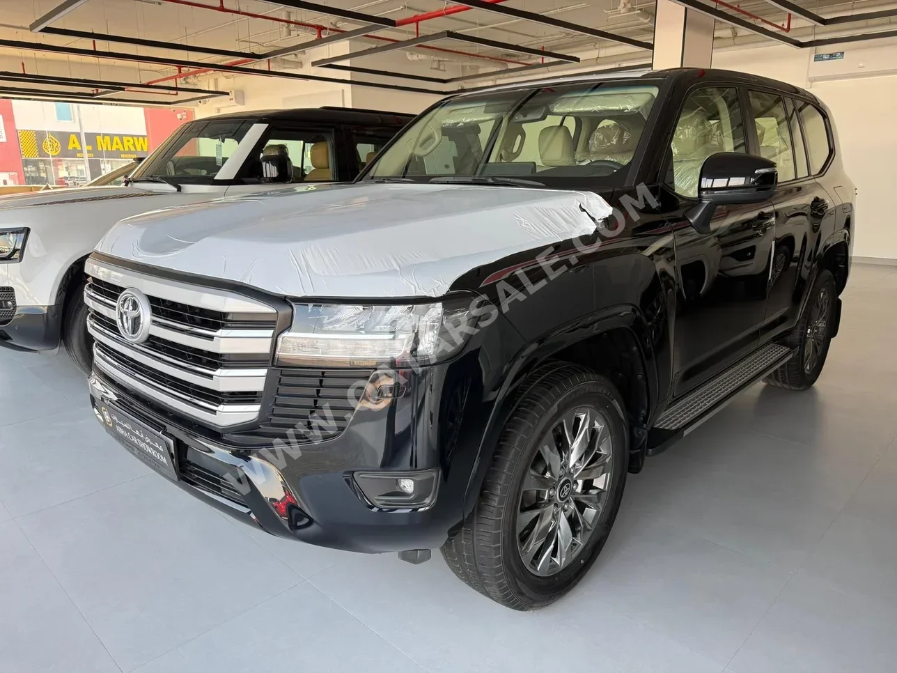 تويوتا  لاند كروزر  جي اكس ار  2024  اوتوماتيك  0 كم  6 سلندر  دفع رباعي  اس يو في  أسود  تحت الضمان