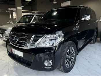 Nissan  Patrol  Platinum  2014  Automatic  250,000 Km  8 Cylinder  Four Wheel Drive (4WD)  SUV  Black