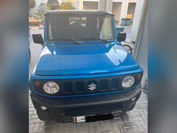 Suzuki  Jimny  GLX  2022  Automatic  41,000 Km  4 Cylinder  Four Wheel Drive (4WD)  SUV  Black and Blue