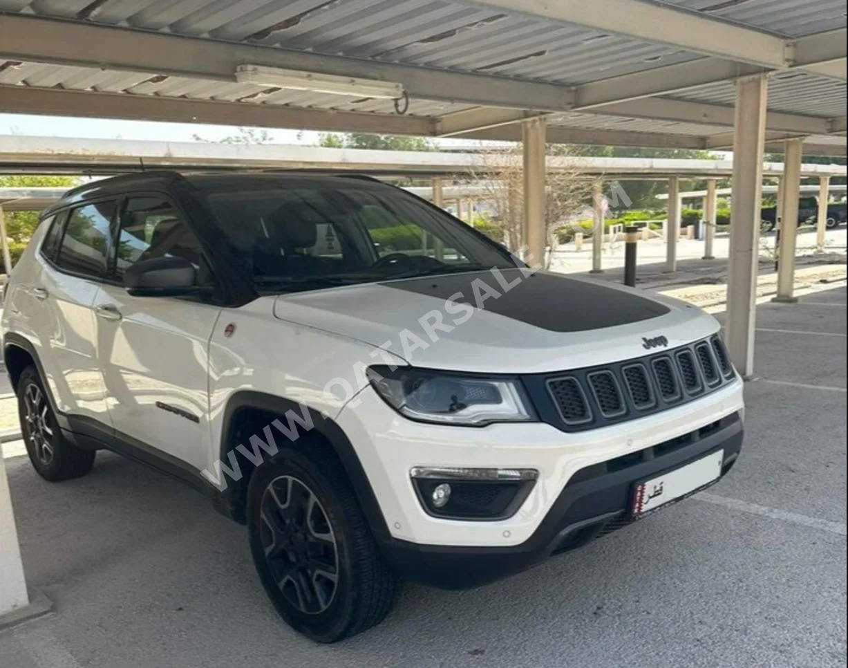 Jeep  Compass  Trailhawk  2019  Automatic  129,000 Km  4 Cylinder  Four Wheel Drive (4WD)  SUV  White and Black