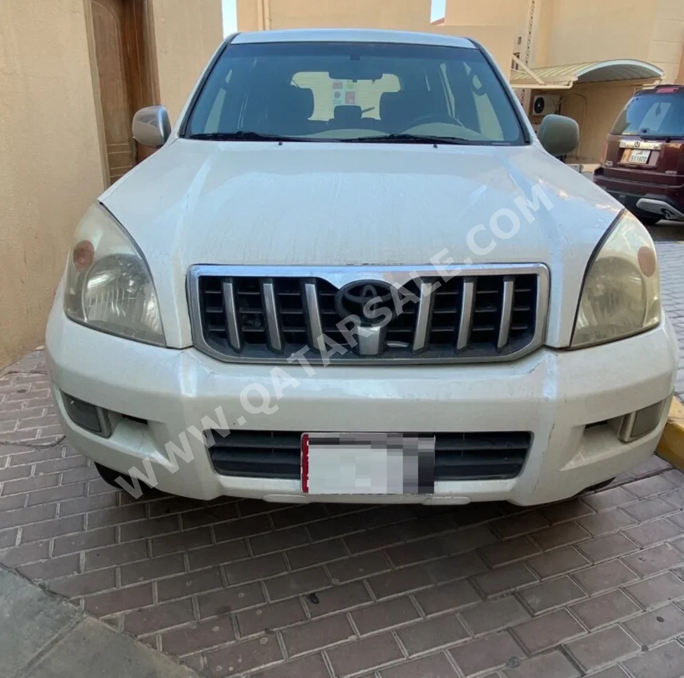 Toyota  Prado  GX  2009  Automatic  374,000 Km  6 Cylinder  Four Wheel Drive (4WD)  SUV  White