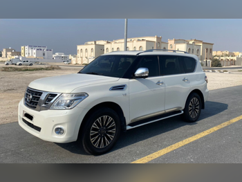 نيسان  باترول  بلاتنيوم  2014  اوتوماتيك  200,000 كم  8 سلندر  دفع رباعي  اس يو في  أبيض