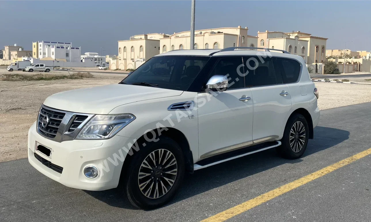 نيسان باترول بلاتنيوم 2014 اوتوماتيك 200,000 كم 8 سلندر دفع رباعي اس يو في أبيض