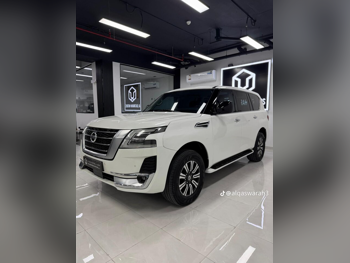 نيسان  باترول  أكس أي  2020  اوتوماتيك  200,000 كم  6 سلندر  دفع رباعي  اس يو في  أبيض