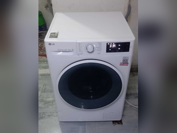 مجموعات الغسالات والمجففات ال جي \  8 كغ  أبيض  غسالة بالبخار  مجفف بخار  مع التسليم  مع التركيب  غسالة تحميل أمامي  كهرباء