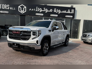 جي ام سي  سييرا  اس ال تي  2025  اوتوماتيك  25,000 كم  8 سلندر  دفع رباعي  بيكب  أبيض  تحت الضمان