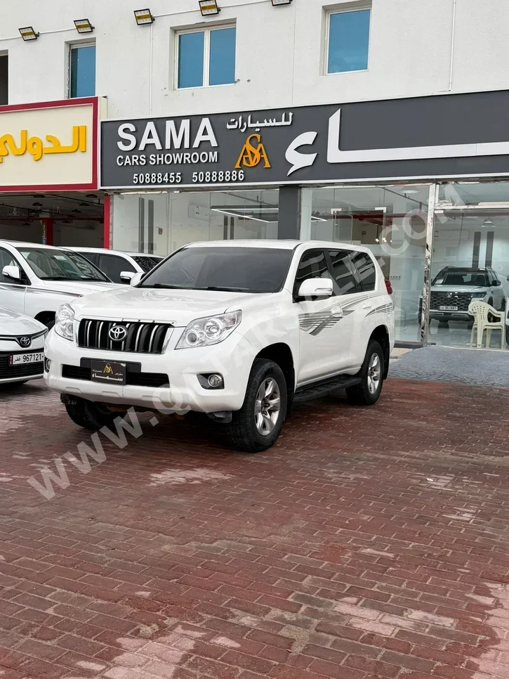 تويوتا برادو تي اكس ال 2013 اوتوماتيك 190,000 كم 4 سلندر دفع رباعي اس يو في أبيض