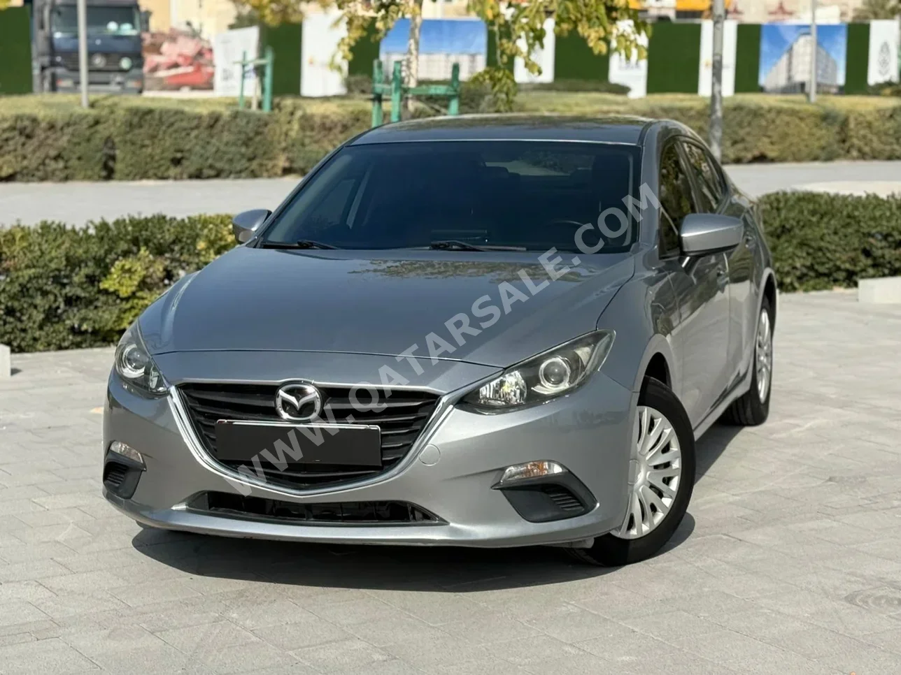Mazda  Mazda 3  2015  Automatic  125,000 Km  4 Cylinder  Front Wheel Drive (FWD)  Sedan  Gray
