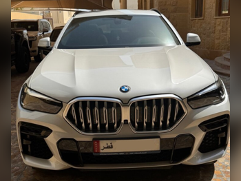 BMW  X-Series  X6 40i  2022  Automatic  60,000 Km  6 Cylinder  All Wheel Drive (AWD)  SUV  White  With Warranty