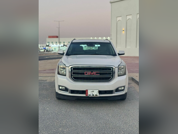 GMC  Yukon  SLE  2017  Automatic  225,000 Km  8 Cylinder  Rear Wheel Drive (RWD)  SUV  White