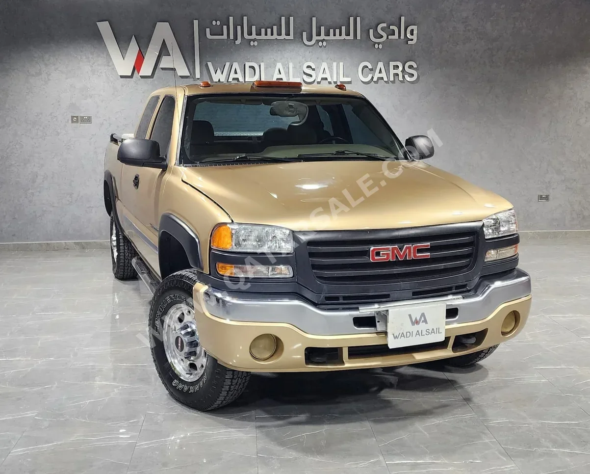 GMC  Sierra  2500 HD  2006  Automatic  439,000 Km  8 Cylinder  Four Wheel Drive (4WD)  Pick Up  Gold