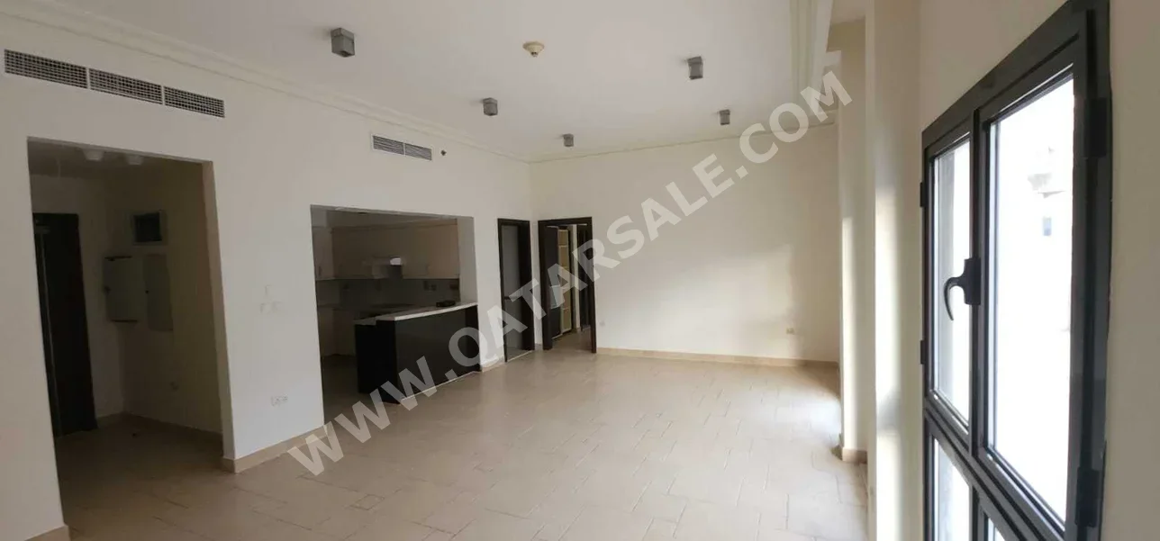2 Bedrooms  Apartment  For Rent  in Doha -  The Pearl  Semi Furnished