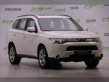 ميتسوبيشي  أوت لاندر  2014  اوتوماتيك  150,000 كم  4 سلندر  دفع رباعي  اس يو في  أبيض