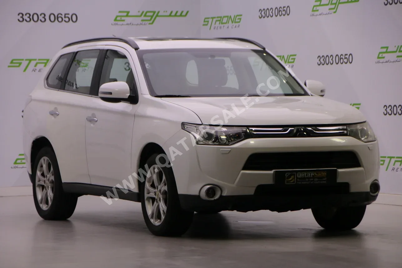 Mitsubishi  Outlander  2014  Automatic  150,000 Km  4 Cylinder  Four Wheel Drive (4WD)  SUV  White