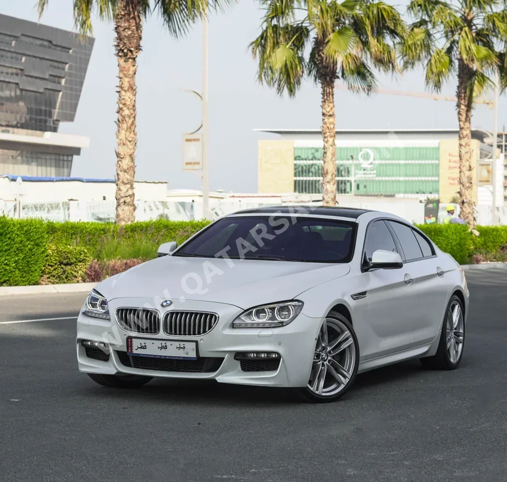 بي ام دبليو  الفئة - السادسة  650i  2013  اوتوماتيك  27,000 كم  8 سلندر  دفع خلفي  سيدان  أبيض  تحت الضمان