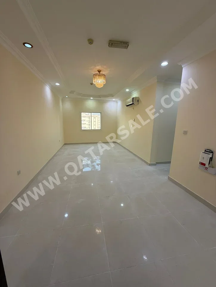 2 Bedrooms  Apartment  For Rent  in Doha -  Najma  Not Furnished