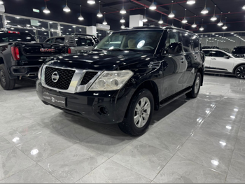 Nissan  Patrol  XE  2013  Manual  313,000 Km  6 Cylinder  Four Wheel Drive (4WD)  SUV  Black