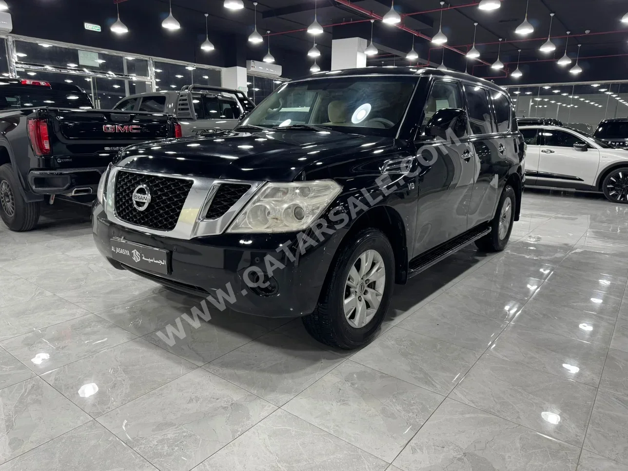 نيسان باترول أكس أي 2013 عادي 313,000 كم 6 سلندر دفع رباعي اس يو في أسود