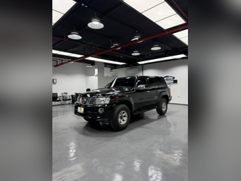 Nissan  Patrol  Safari  2006  Manual  58,000 Km  6 Cylinder  Four Wheel Drive (4WD)  SUV  Black