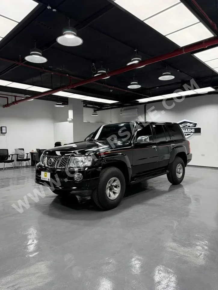 Nissan  Patrol  Safari  2006  Manual  58,000 Km  6 Cylinder  Four Wheel Drive (4WD)  SUV  Black